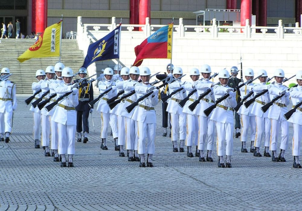 Honor Guard of Republic of China at Chiang Kai-shek Memorial Hall, Taipei City, Taiwain, 2004. <br>CREDIT: <a href="https://commons.wikimedia.org/wiki/File:Military_parade_in_front_of_Chiang_Kai-shek_Memorial_Hall.jpg">Batiste Pannetier/Free Art License</a>.