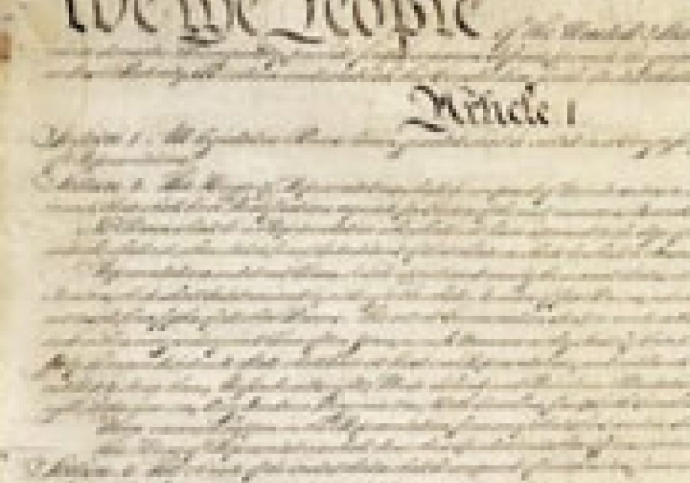 Constitutions reflect the role of political <br>power because they provide a balance <br>between competing interests, writes Lang.