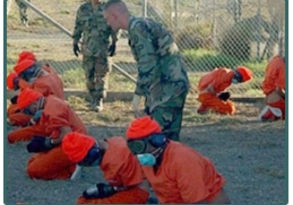Detainees at Camp X-Ray. <br>DoD photo: Shane T. McCoy, U.S. Navy