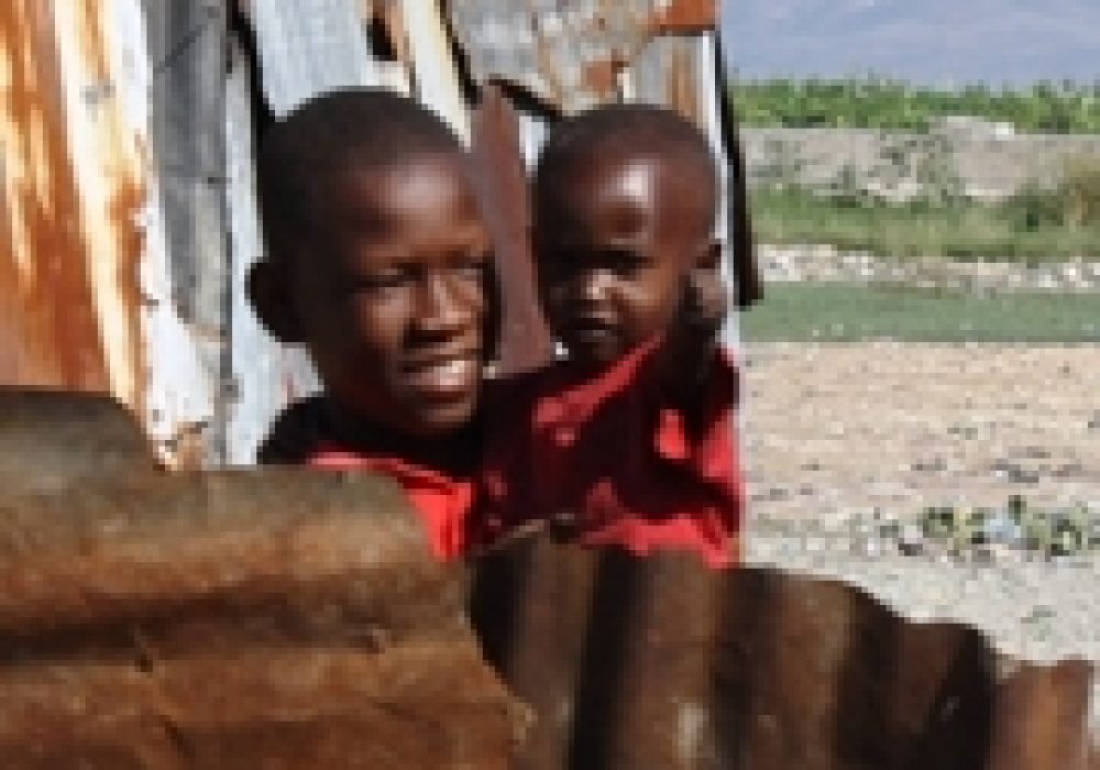 Haitian boys in a metal shanty. Photo by <br>Sean Blaschke &copy; 2009.