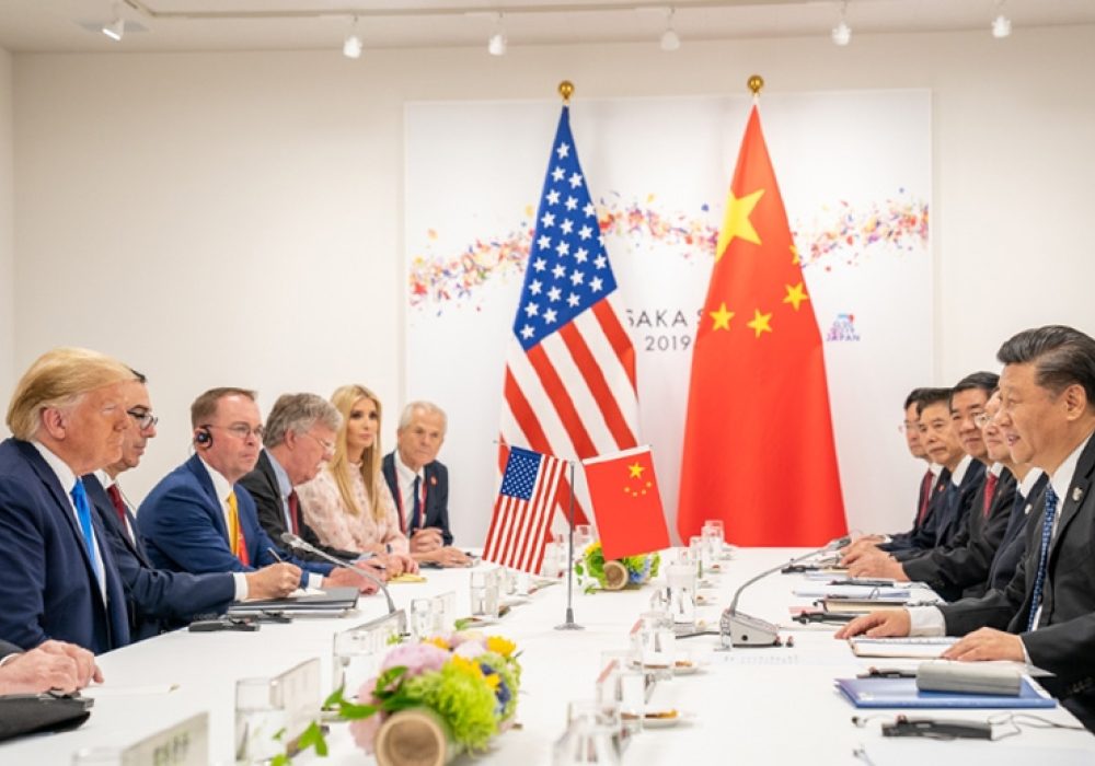 Donald Trump meets with Xi Jinping in June 2019 at the G20 Summit in Osaka, Japan. CREDIT: <a href=https://www.flickr.com/photos/whitehouse/48162295476/>Official White House Photo/Shealah Craighead (CC)</a>.