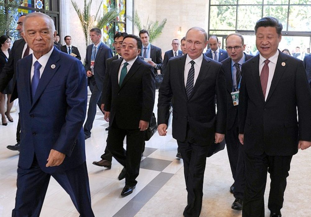 (L to R) Former Uzbeki President Islam Karimov, Russian President Vladimir Putin, Chinese President Xi Jinping in Tashkent, Uzbekistan, June 2016. CREDIT: <a href=http://en.kremlin.ru/events/president/news/52257>kremlin.ru (CC)</a>