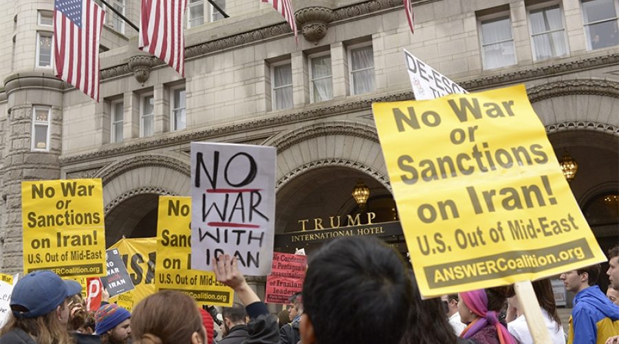 Protesters at Trump International Hotel in Washington, DC after the drone strike that killed Soleimani. CREDIT: <a href=https://www.flickr.com/photos/stephenmelkisethian/49329666788/>Stephen Melkisethian (CC)</a>.