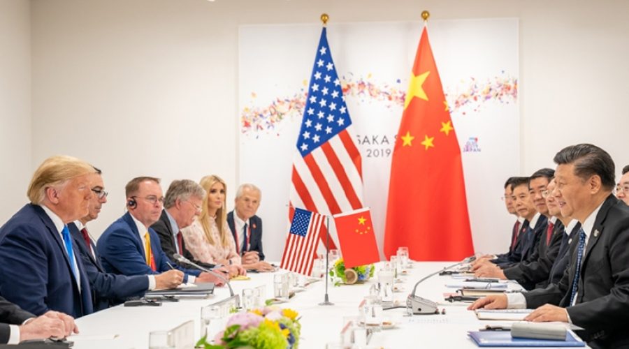 Donald Trump meets with Xi Jinping in June 2019 at the G20 Summit in Osaka, Japan. CREDIT: <a href=https://www.flickr.com/photos/whitehouse/48162295476/>Official White House Photo/Shealah Craighead (CC)</a>.