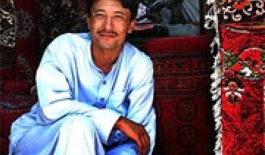 Carpet vendor in Kabul, Afghanistan <br>(2005). Photo by <a href="http://flickr.com/photos/babasteve/25456049/">Steve Evans</a> (<a href="http://creativecommons.org/licenses/by/2.0/deed.en-us">CC</a>).