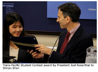 photo of President Joel Rosenthal awards Shiran Shen certificate for Ttrans-Pacific Essay Contest