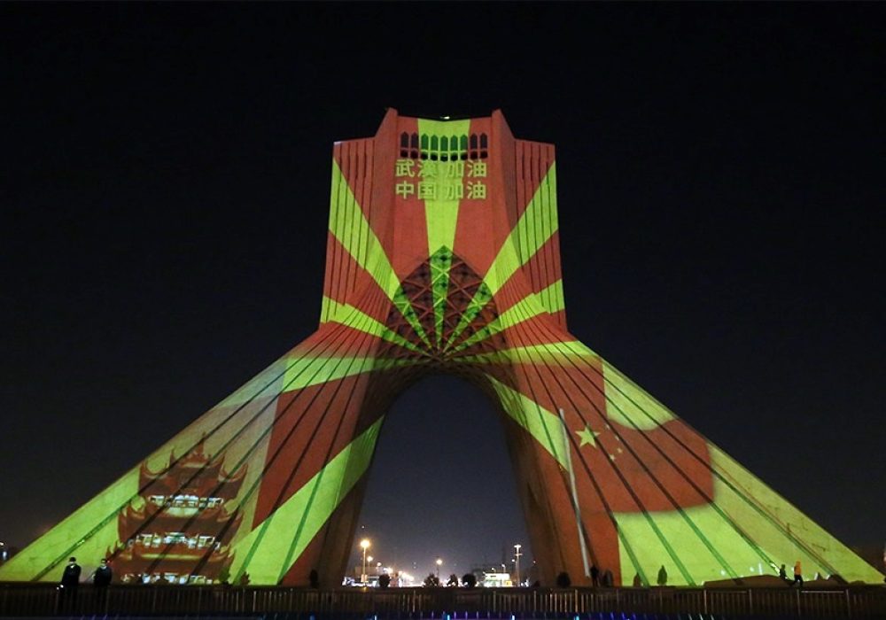 Tehran's Azadi Tower lights in support of China against coronavirus, February 2020. CREDIT: <a href="https://commons.wikimedia.org/wiki/File:Azadi_Tower_lights_in_support_of_China_against_coronavirus_2.jpg">Amin Yari (CC)</a>