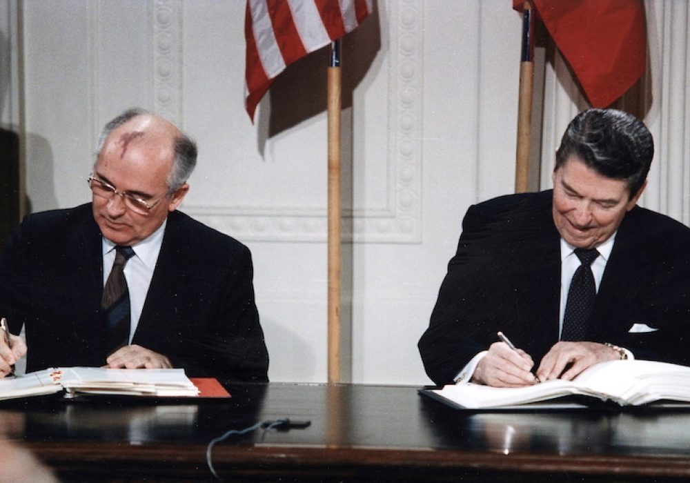 Reagan and Gorbachev signing the INF Treaty at the White House, December, 1987. CREDIT: <a href="https://commons.wikimedia.org/wiki/File:Reagan_and_Gorbachev_signing.jpg">White House Photographic Office/Public Domain</a>