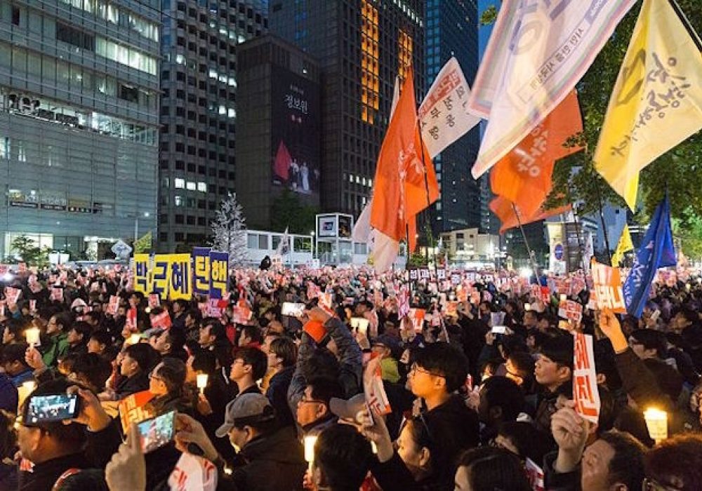 Protest against now-impeached South Korean President Park Geun-hye in Seoul, October 2016. CREDIT: <a href="https://www.flickr.com/photos/tkazec/30021968224/">Teddy Cross</a><a href="https://creativecommons.org/licenses/by/2.0/"> (CC)</a>