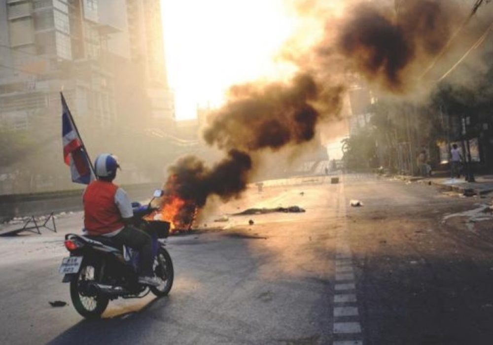 Detail from book cover of <i>The Owners of the Map: Motorcycle Taxis Drivers, Mobility, and Politics in Bangkok</i>