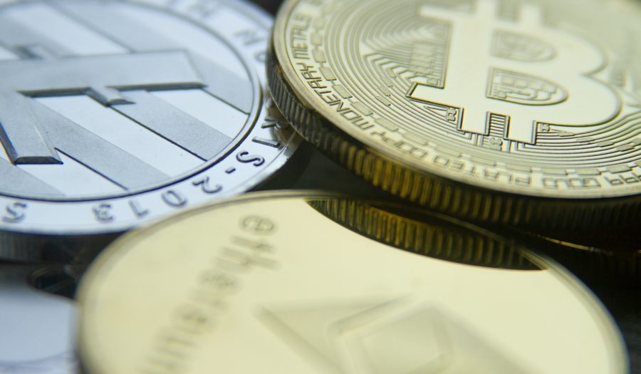 Photo of a Bitcoin, Ethereum, and Litecoin