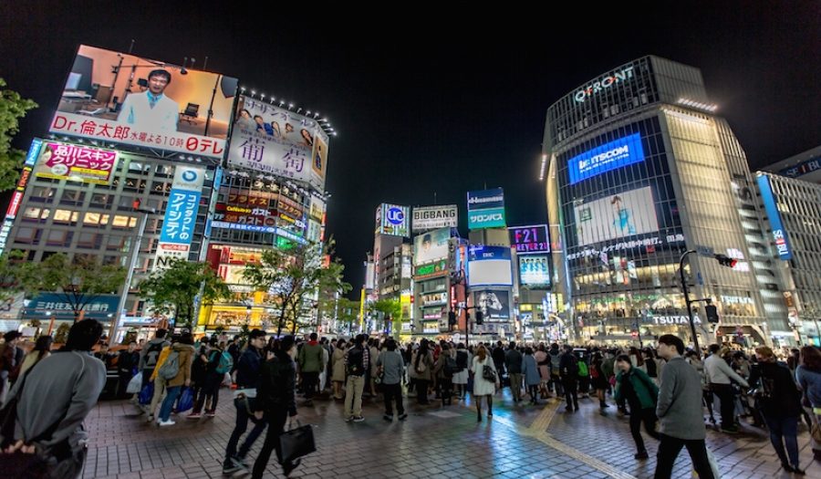 Shibuya District, Tokyo. CREDIT: <a href="https://en.wikipedia.org/wiki/Shibuya#/media/File:Shibuya_District_at_Night_2015-04_(17806976882).jpg">IQRemix (CC)</a>